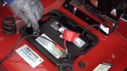 Learn how to charge a battery in a riding lawn mower.