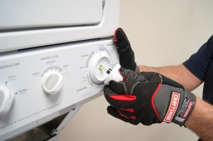 PHOTO: Remove the washer timer knob.