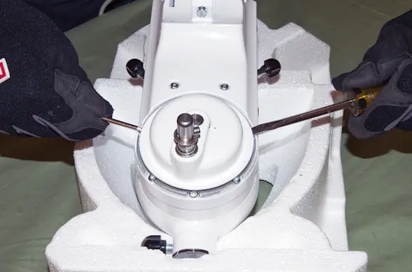 PHOTO: Pry off the gear housing.