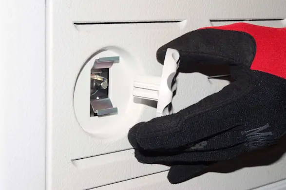 PHOTO: Pull off the control knob.