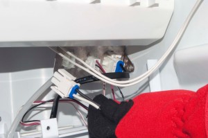 PHOTO: Plug in the drain pump wire harness.