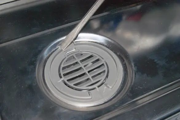 PHOTO: Remove the door vent grill.