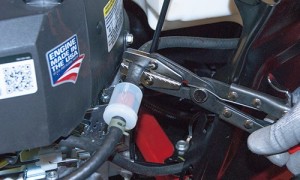 PHOTO: Clamp off the fuel line.