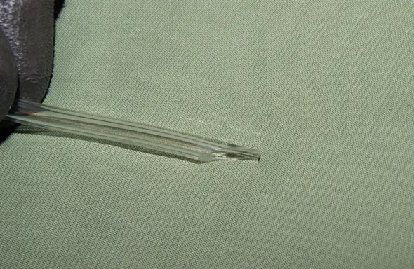 PHOTO: Fuel line cut at an angle.
