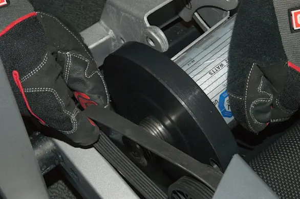 PHOTO: Release the drive belt.