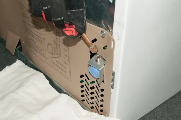 PHOTO: Disconnect the water supply line.