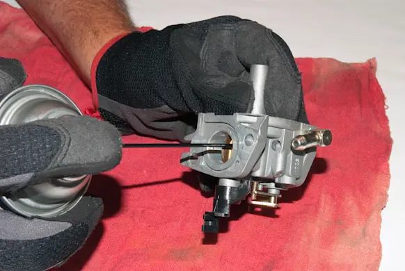 PHOTO: Clean the carburetor.