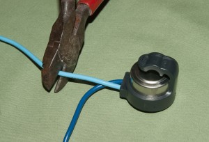 PHOTO: Cut the defrost bi-metal wires.