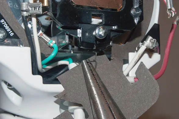 PHOTO: Reinstall the spring.