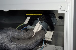 PHOTO: Remove the wires from the dryer timer.