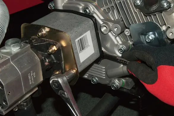 PHOTO: Remove the flange lock nuts.