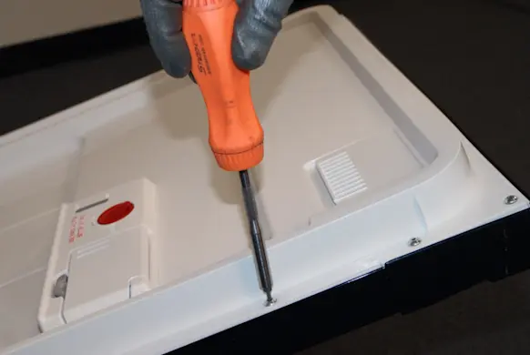 PHOTO: Remove the inner door panel screws.