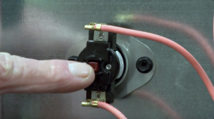Troubleshooting thermal switch problems on a wall oven.