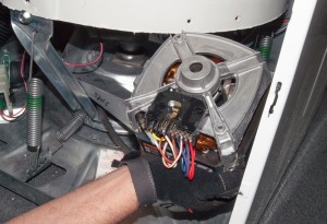 PHOTO: Remove the washer drive motor.