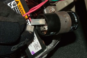 PHOTO: Detach the wires from the drive motor capacitor.