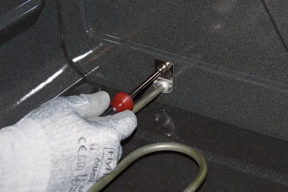 PHOTO: Remove the mounting screws.