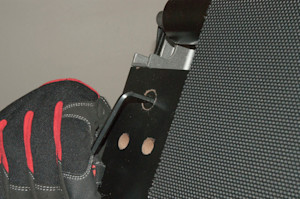 Remove the right side corner screws.