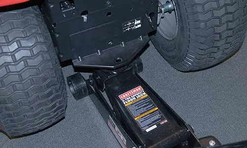 PHOTO: Lower the riding mower.