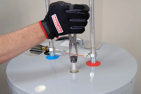 PHOTO: Remove the anode rod.