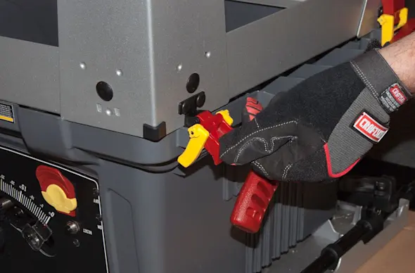 PHOTO: Release the locking levers.