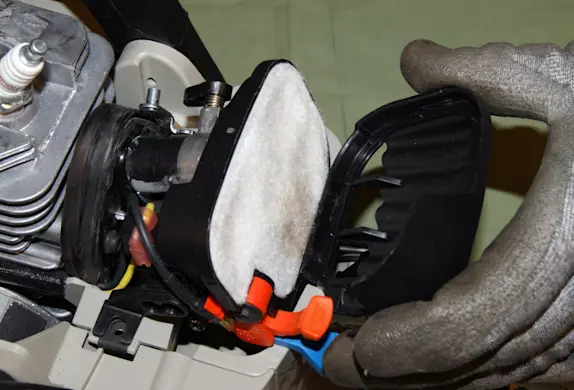 PHOTO: Remove the air filter cover.
