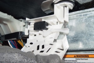 PHOTO: Install the new dishwasher overfill float switch.