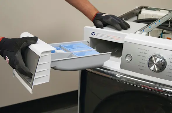 PHOTO: Remove the dispenser drawer.