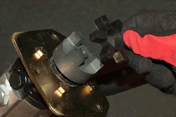 PHOTO: Remove the flexible coupler.