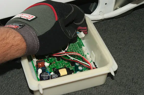 PHOTO: Disconnect all wires from the control board.
