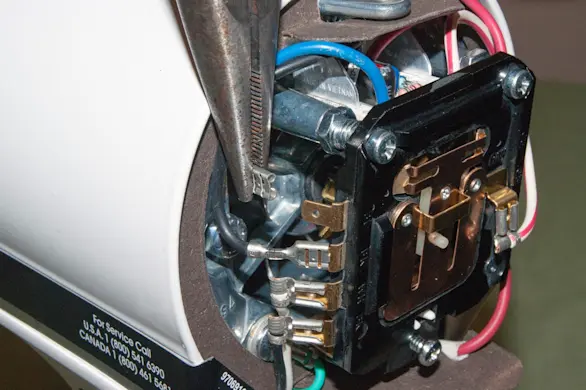 PHOTO: Remove the control plate wires.