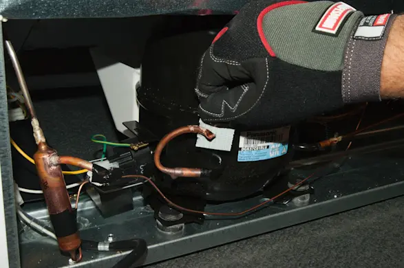 PHOTO: Tape sharp tips of copper tubing to prevent scratching your arm.