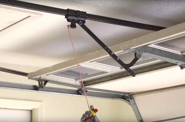 How to open a garage door with an opener manually