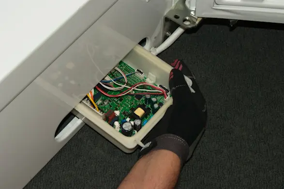 PHOTO: Pull the control board out.