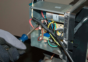 Remove the mounting screws from the control board.
