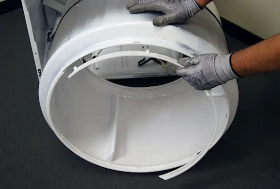 PHOTO: Remove the drum glide bearing.