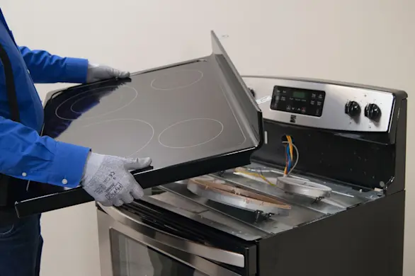 PHOTO: Remove the glass cooktop.