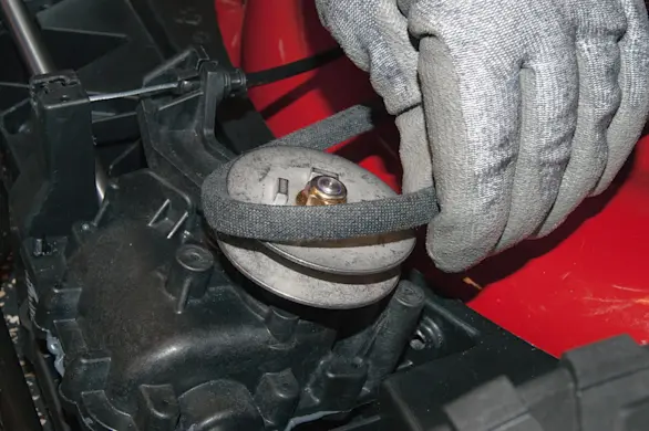 PHOTO: Release the drive belt.