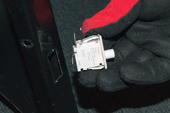 PHOTO: Remove the start switch.