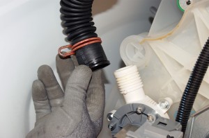 PHOTO: Pull the drain hose off the drain pump.

Pull the drain hose off of the drain pump.