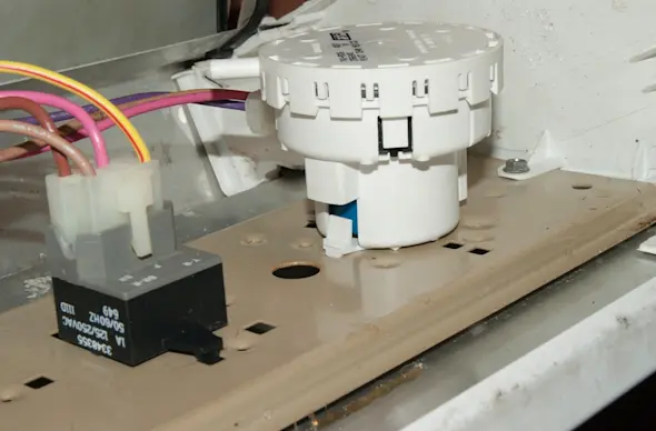 PHOTO: Install the new pressure switch.