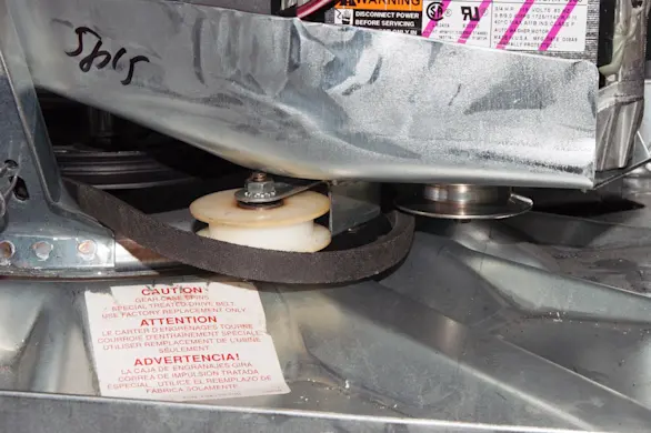 PHOTO: Release the washer drive belt.