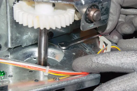 PHOTO: Install the new gear and sprocket assembly