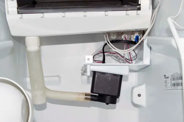 PHOTO: Connect the recirculation pump outlet tube.