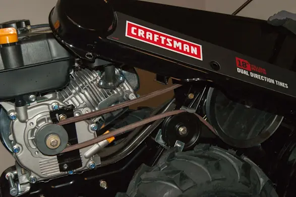 PHOTO: Pull the drive belt cover off and set it aside.