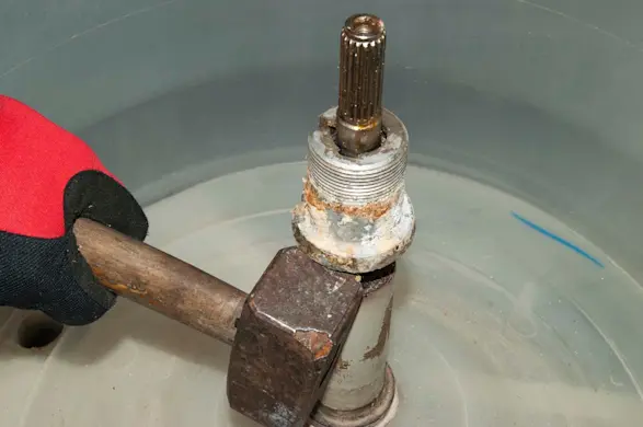 PHOTO: Remove the drive block from the drive shaft.