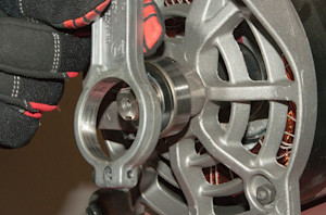 Pull the connecting rod off the bearing.