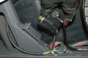 Slide new motor under the top screws.