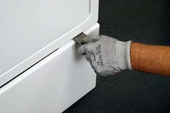 PHOTO: Release the service panel clips.