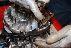 PHOTO: Tighten the coil mounting screws.