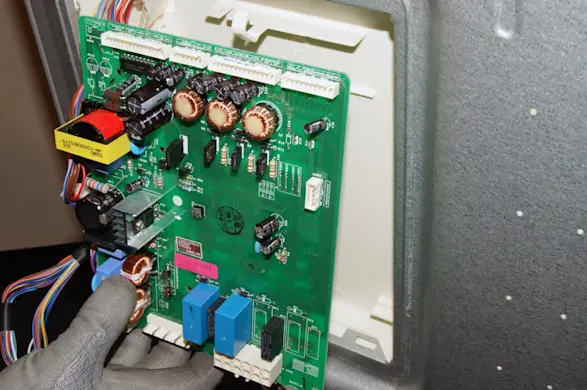 PHOTO: Remove the control board.